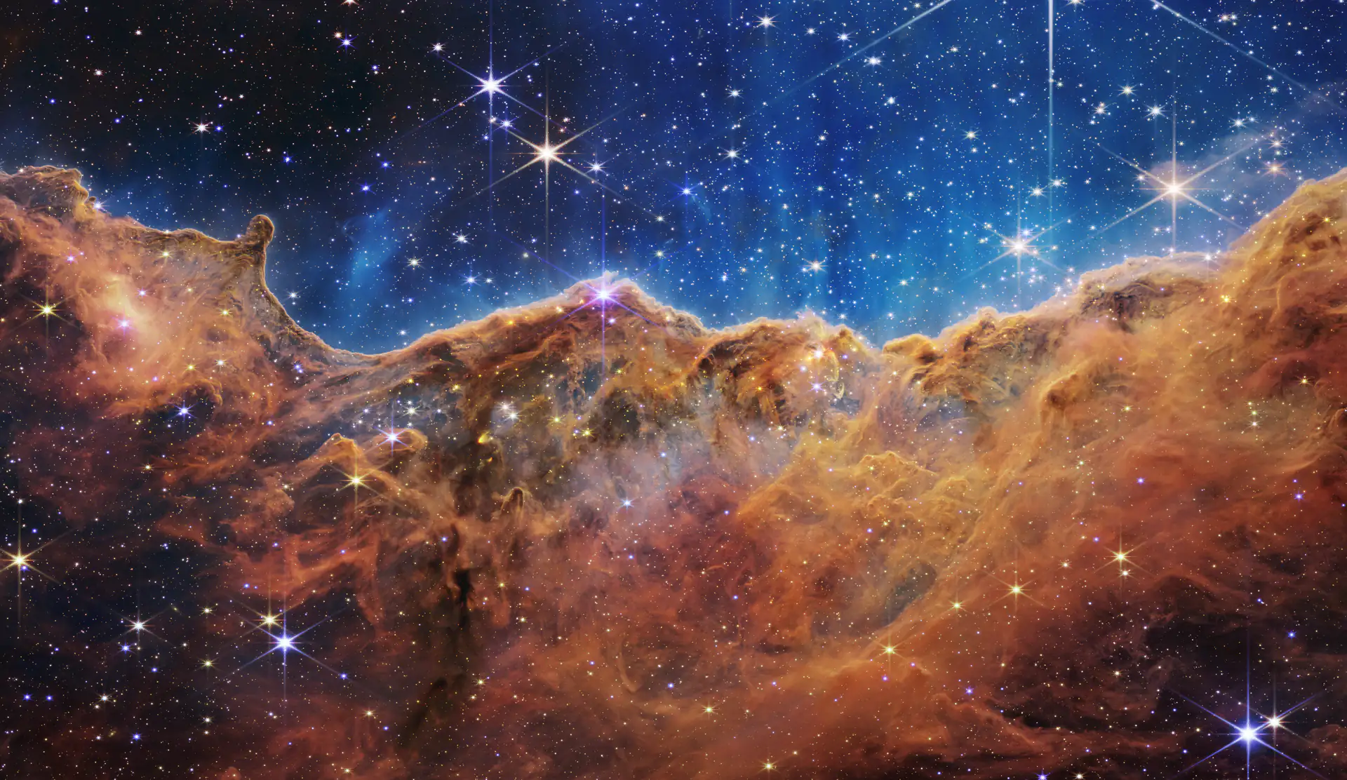 The Cosmic Cliffs of the Carina Nebula, photographed by the James Webb Space Telescope