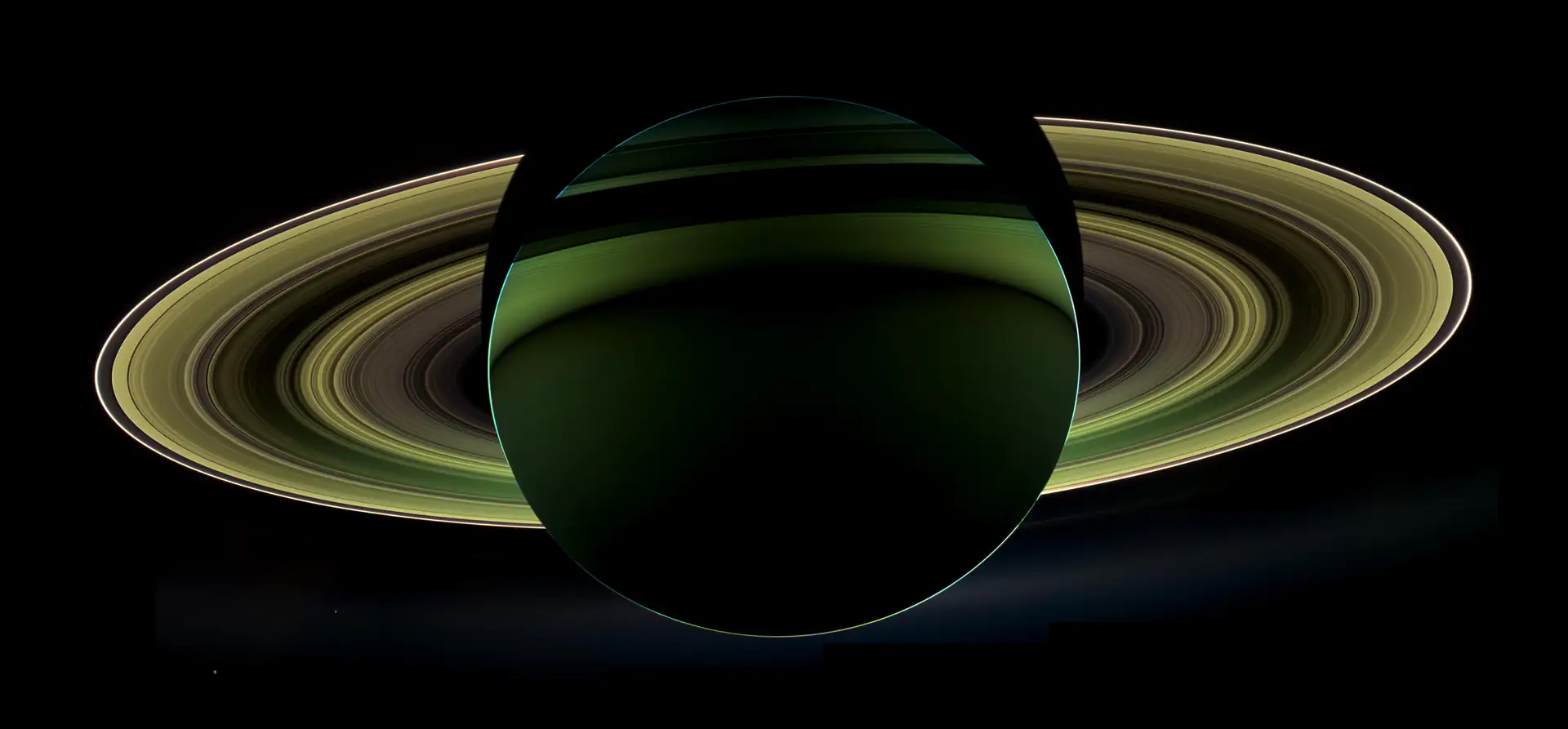 Saturn backlit by the Sun, photographed by the Cassini probe